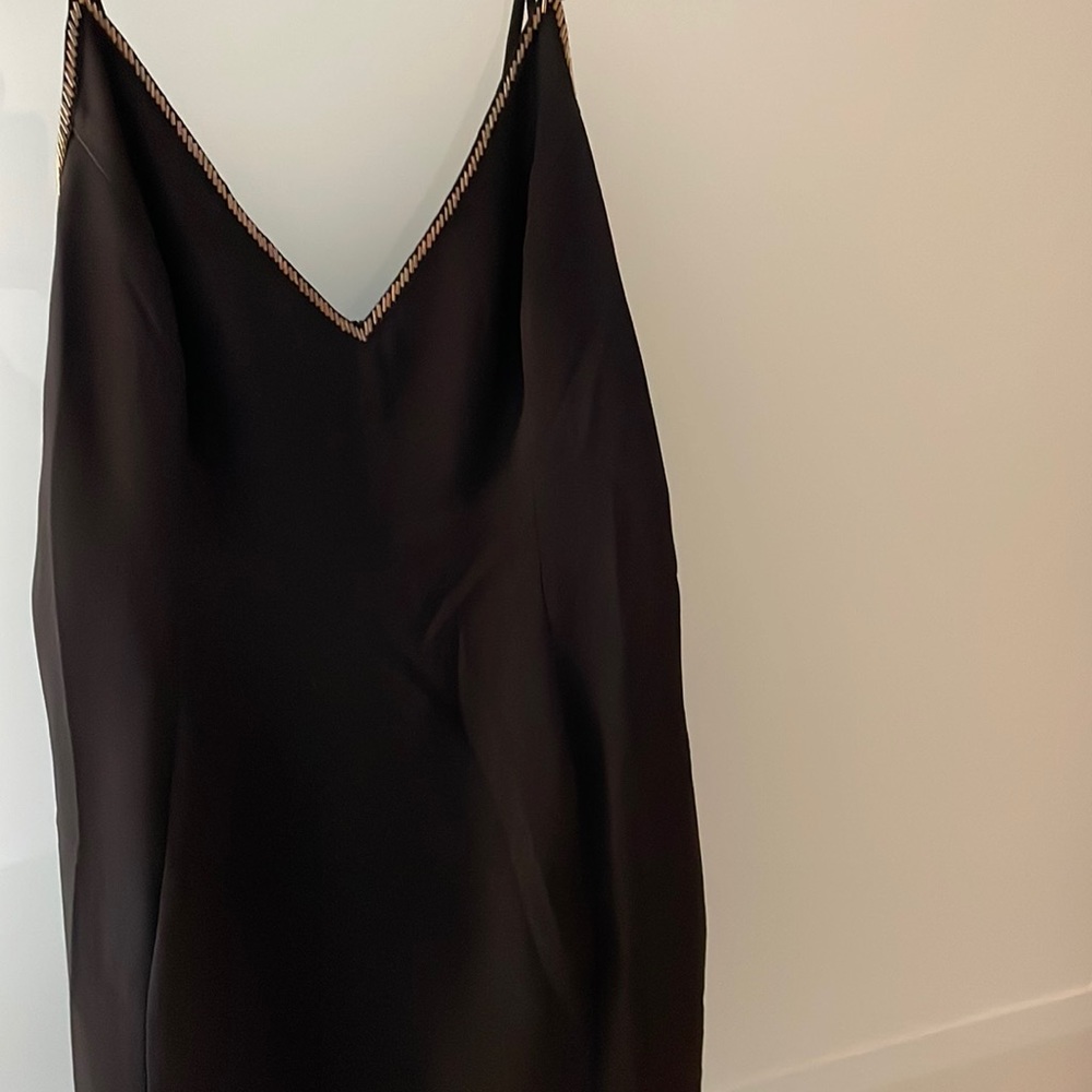 Black mini dress with gold trimming
